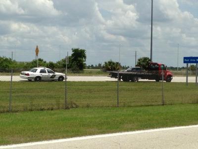 The Sheriff pulling over the tow truck