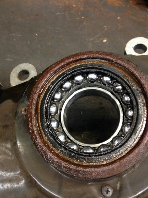 Wheel bearing failure due to a loose engine ground wire.